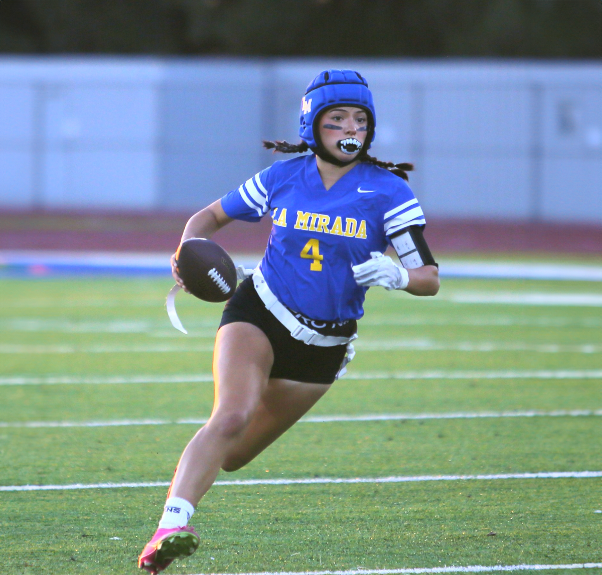 Jael Arreguin rushes up the field in a game versus John Glenn High School (Photo by Carol Emmerling)