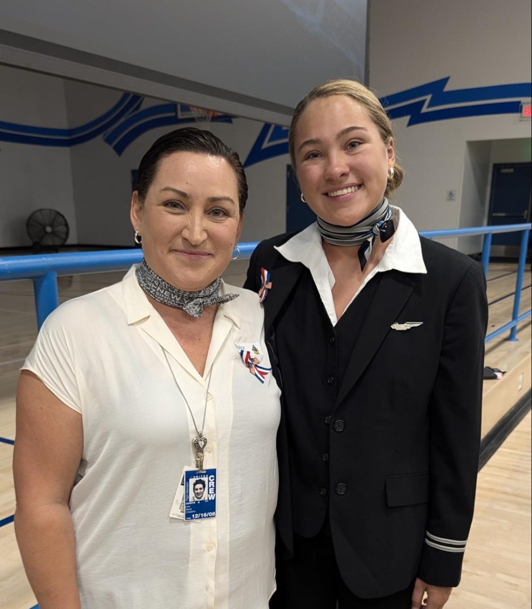 Lilia Chastine with her daughter, student Ruby Chastine. Ruby wore a United Airlines flight attendant uniform during the Remembrance Ceremony.