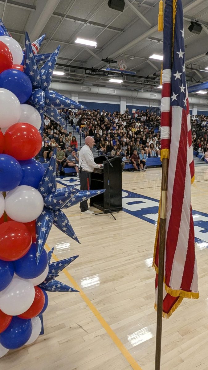 Principal Ben Webster addresses the students and staff on Thursday, September 11, 2025 during the 9/11 Remembrance